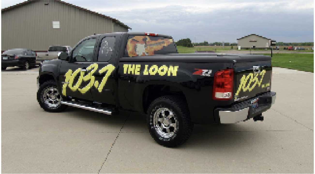 Black truck with graphic wrap